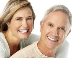 Smiling Couple | The Foehr Group in Bloomington, IL | Dr. Wolf